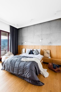 Drewno i beton architektoniczny w sypialni styl nowoczesny