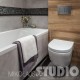 Brązowo-szara łazienka z wanną w nowoczesnym stylu