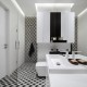 Biało-czarna łazienka z podwieszanym sufitem pracownia projektowa Madama