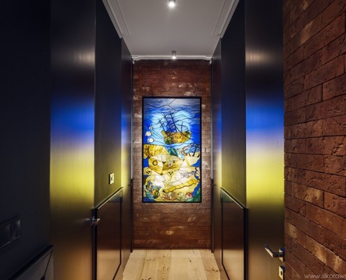 Nowoczesny przedpokój w czerwonej cegle Sikora Wnętrza