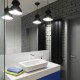 Industrialna łazienka z pralnią Hola Design