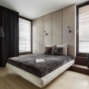 Piękna sypialnia w minimalistycznym wydaniu z tapicerowaną ścianą