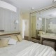 Oryginalny wystrój sypialni w jasnych kolorach Hola Design