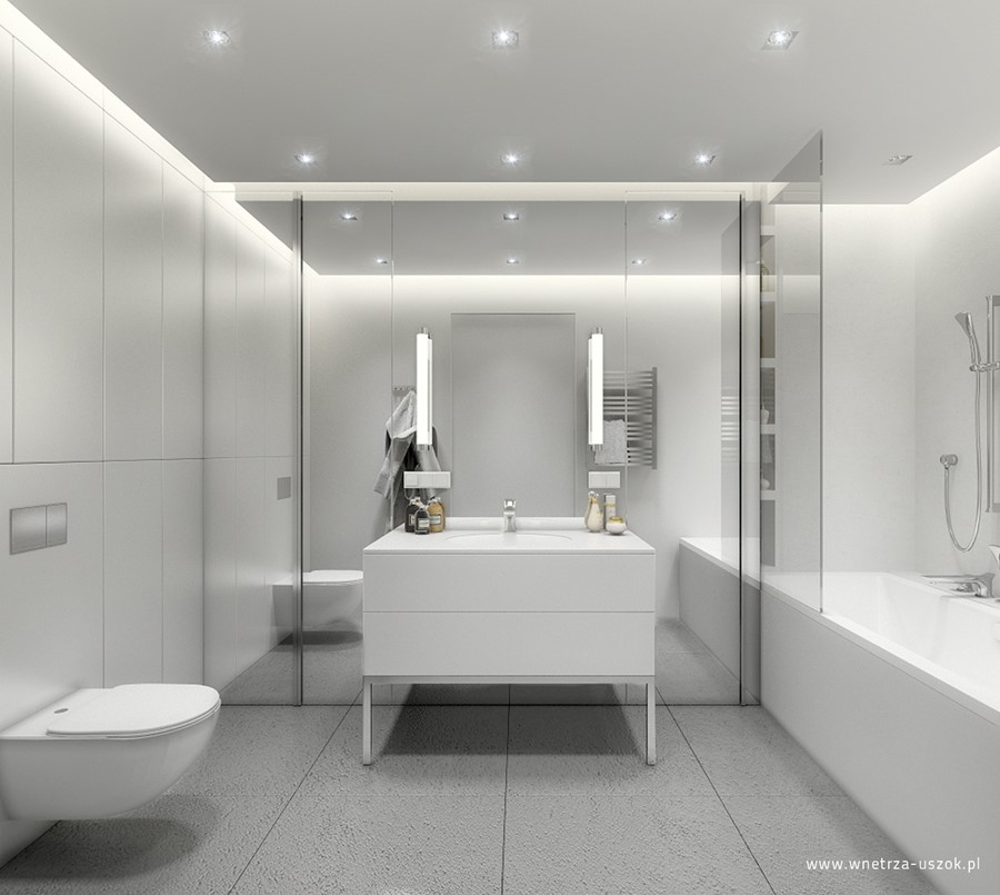 Minimalistyczna łazienka z lustrzaną ścianą