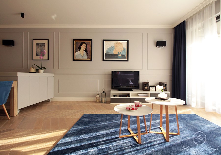 Eklektyczna koncepcja otwartego wnętrza - dywan w salonie