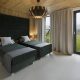 Sypialnia dla gości wykończona drewnem Hola Design