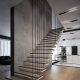 Podwieszane schody w minimalistycznym holu Jach Architects