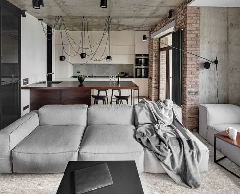 Industrialny salon z kuchnią - płytki podłogowe imitujące kamień Stile Libero
